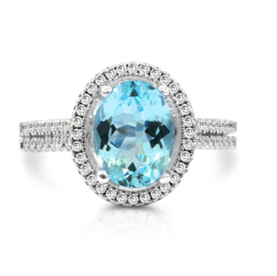 Limited-Stock Jewelry Sale – Once It's Gone, It's Gone 9X7MM Oval Blue Topaz and White Topaz Halo Ring in Sterling Silver