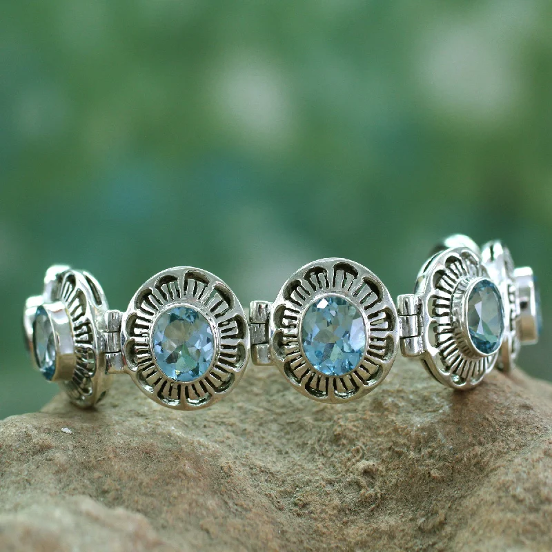 Make Every Moment Shine – Jewelry Discounts Available Sky Blossoms Blue Topaz Link Bracelet