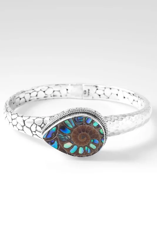 Handmade Pearl Jewelry For Timeless Elegance Patient in Trials Bangle™ in Ammonite with Abalone Inlay Handmade Pearl Jewelry For Timeless Elegance Patient in Trials Bangle™ in Ammonite with Abalone Inlay