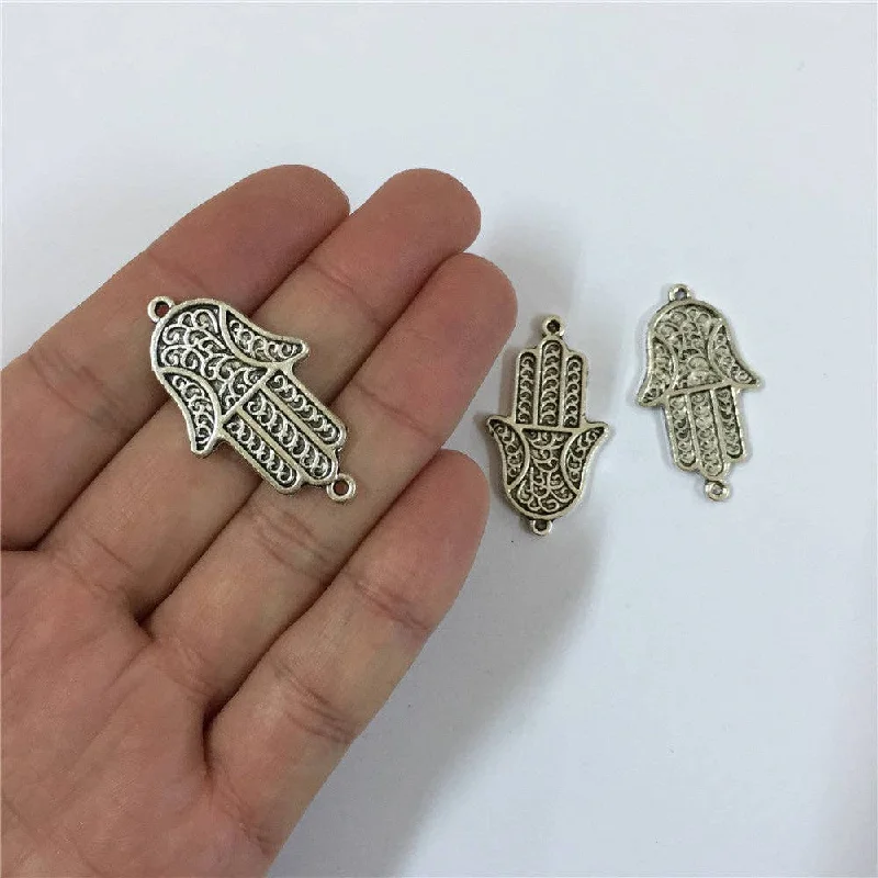 Luxury Jewelry Without The Luxury Price Tag 10 units antique sliver hand of fatima pendant charms jewelry finding suppliers D-3-116
